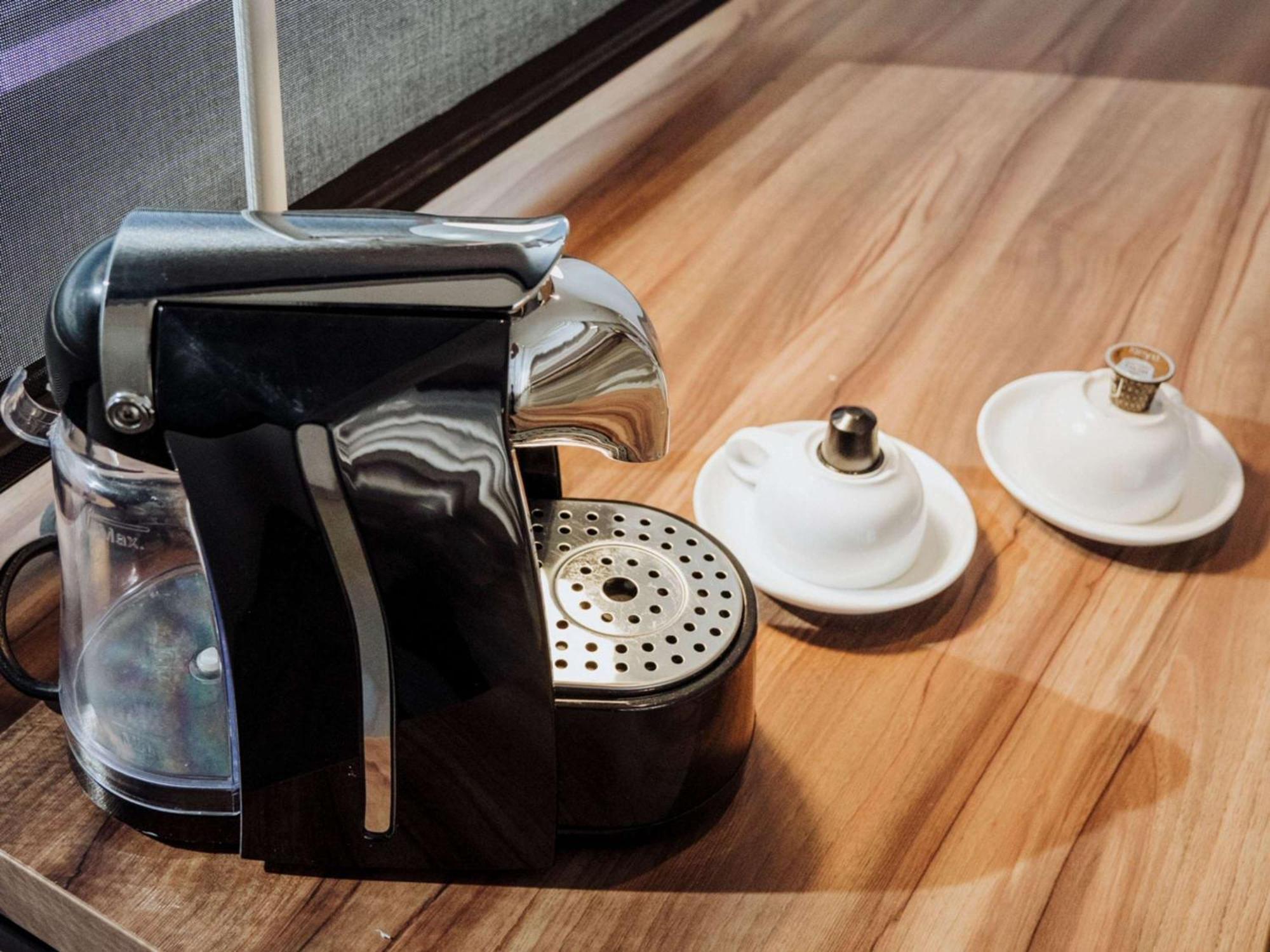 Novotel Medellin El Tesoro Esterno foto A Nespresso coffee machine